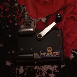 Top o matic cigarette machine